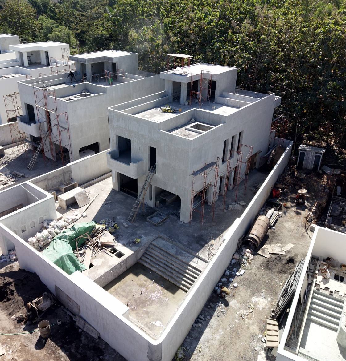 Villa under construction with trades on site